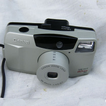 The Canon CANON SURE SHOT 60ZOOM GLUE ROLL CAMERA