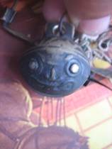 The loud double-sided sculpture of the Republics sound loud tiger tiger tiger bell hanging convex and word letter