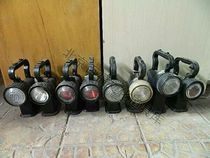 A price-old antique old stock old goods railway sold for sale with a searchlight hand light railway signal lamp