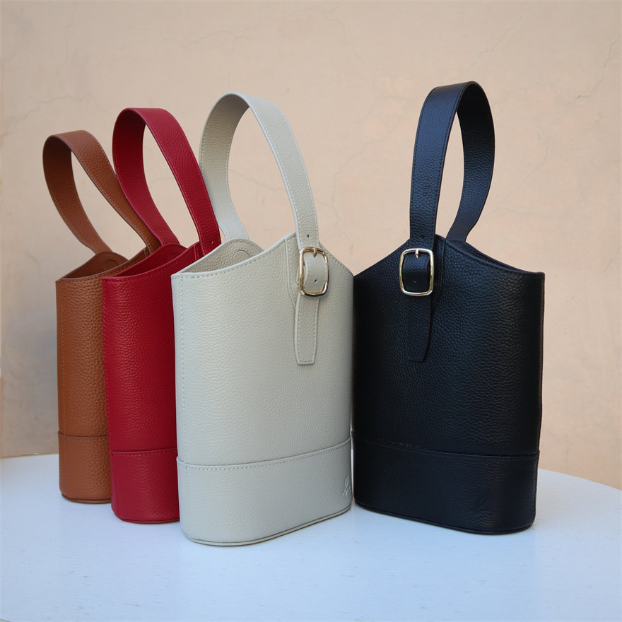 ab Handheld Bag wrist bag Magnetic button head lychee - grain cow skin agb pure color simple