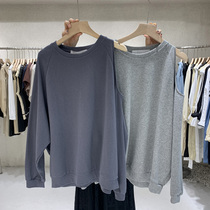 2021 early autumn new South Korea Dongdaemun pure cotton long-sleeved leaky shoulder Korean loose top round-neck pullover sweater women