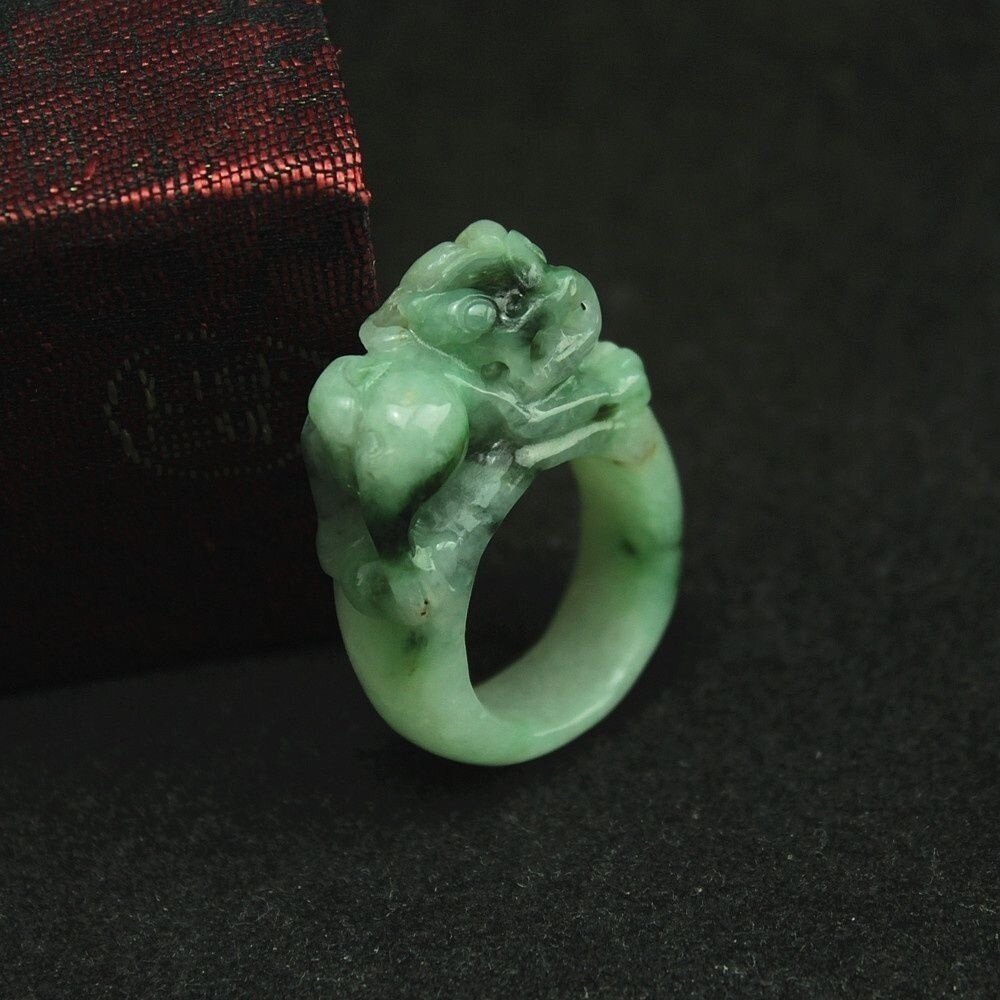 Burmese natural waxy green Pixiu ring and jade