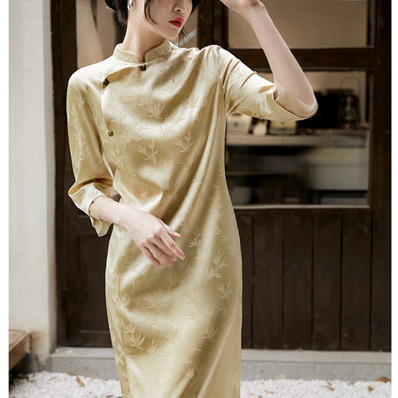 A touch of eastern elegance! this modern chinese-style, refined silk dress  exudes classic charm with
