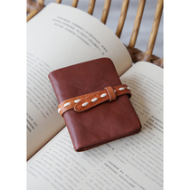 Genuine top-layer vegetable tanned cowhide womens short wallet with two-fold drivers license and multiple card slots drawstring short wallet