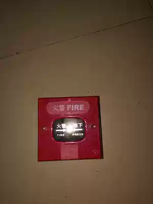 Manually reset the fire button alarm bell switch