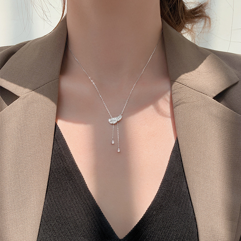 S925 Sterling Silver Sparkling Diamond Feather Long Sweater Necklace New Trendy Niche Design Feminine Sweater Chain Light Luxury S925 Sterling Silver Sparkling Diamond Feather Long Sweater Necklace New Trendy Niche Design Feminine Sweater Chain Light Luxury