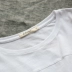 Áo len nữ mùa hè 2018 mới của phụ nữ ngắn tay lệch vai lệch vai áo thun trắng hoang dã SV9235 - Áo phông Áo phông
