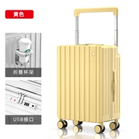 Желтый вместительный и большой чемодан, держатель для стакана