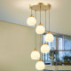 All-Copper Staircase Chandelier for Duplex Villa, Open-Air Living Room, Vertical Hollow American Minimalist French Cream Lighting Fixtures