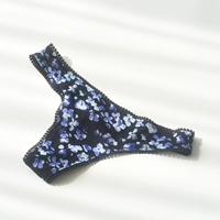 Фиолетовые стринги на черном фоне (без возврата и обмена)