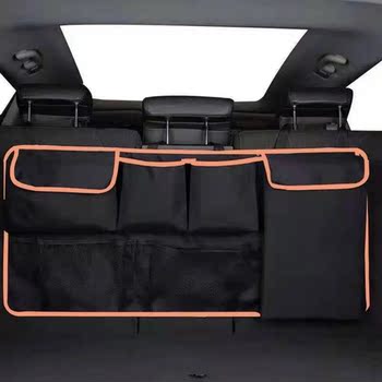 Suspended trunk storage and finishing bag storage bag
