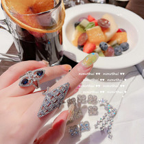 Brilliant deep sea sapphire flower ring for the year of your birth year. 18K gold plated multi-faceted rhombus zircon wide open ring.