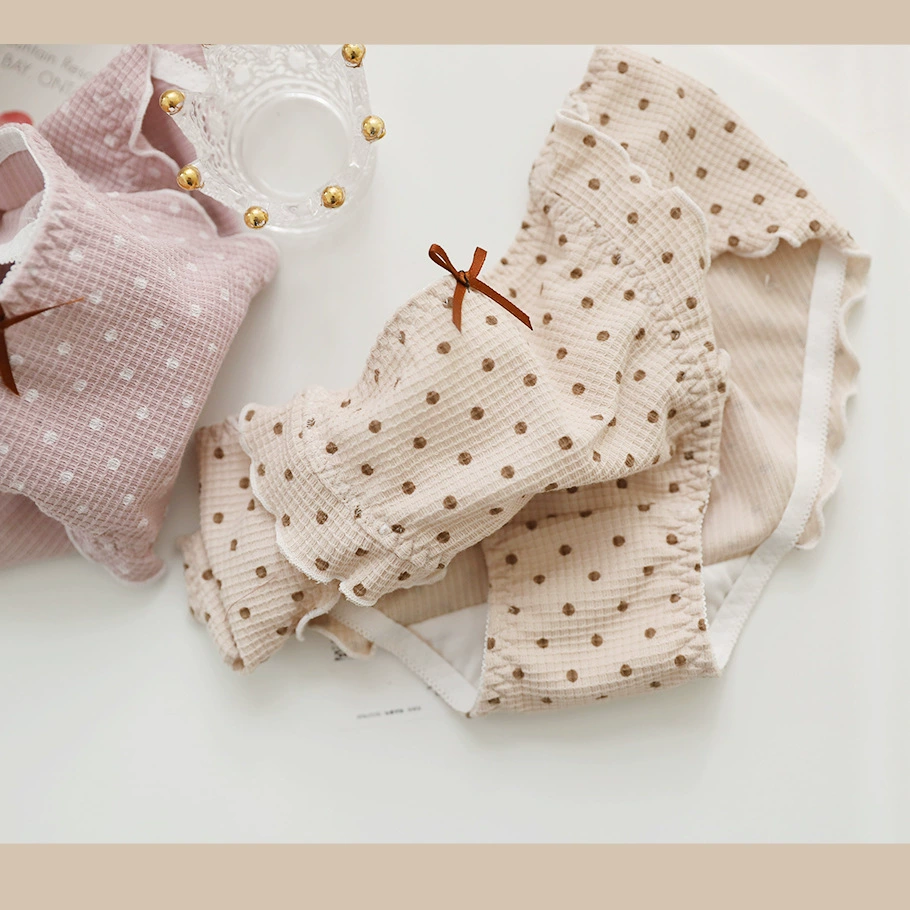 Quần lót nữ cotton ngọt ngào của Nhật Bản nhạt chấm bi cổ điển waffle giữa eo thấp kháng khuẩn ngọt ngào túi đeo hông quần sịp - Giống cái