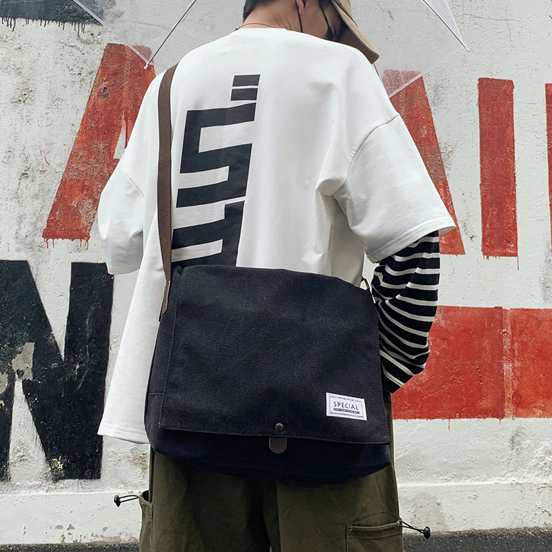Japanese shoulder bag men's messenger bag canvas casual boy backpack Korean version trend student messenger bag tide brand bag