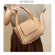 Advanced sense niche leather wings bag womens portable child mother bag 2021 new fashion commuting large capacity shoulder bag