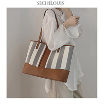 Advanced sense niche design color tote bag female 2021 new fashion commuter portable large capacity shoulder bag female