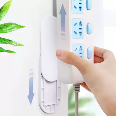 Plug-row holder wall-mounted storage wall adhesive extension cord router no trace-free hole socket organizer