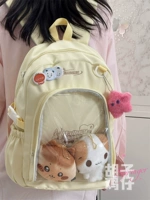 Кремово-желтый с розовыми жирными звездочками.