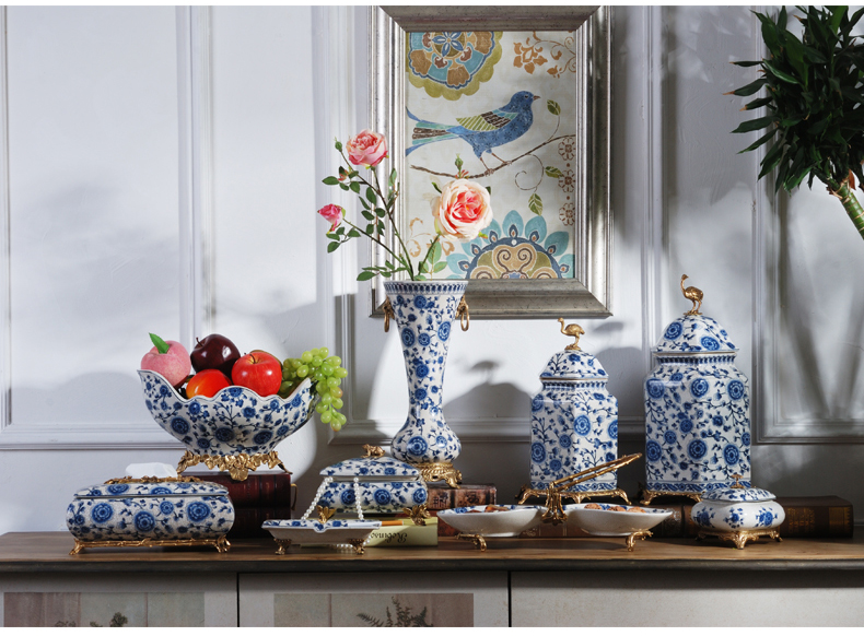 The New Chinese blue and white porcelain with copper fruit bowl dried fruit bowl sitting room home furnishing articles fruit dish of American creative move ceramics