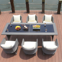 Outdoor courtyard Nordic rattan table and chair rectangular round table rattan five-piece set Hotel Villa restaurant table and chair sunscreen