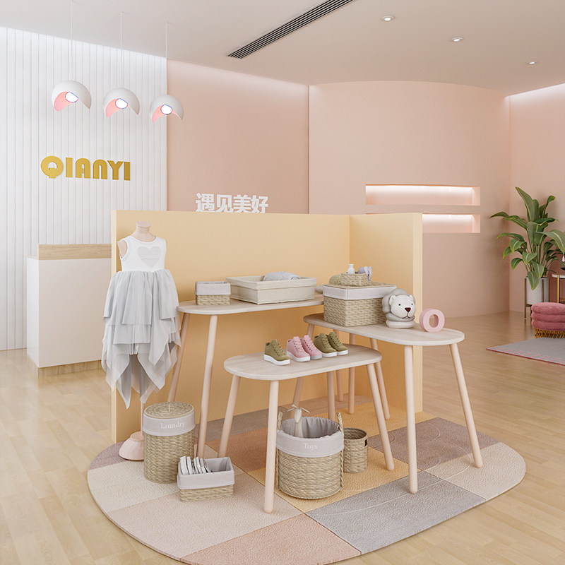Children's clothing store running water table display table high and low display table clothing store Zhongdao display stand creative solid wood floor