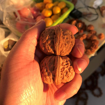 43mm Pinggu Yuanbao lion head wild cultural toy pieces selected hemp walnut round old tree pressed hand gift giving full product