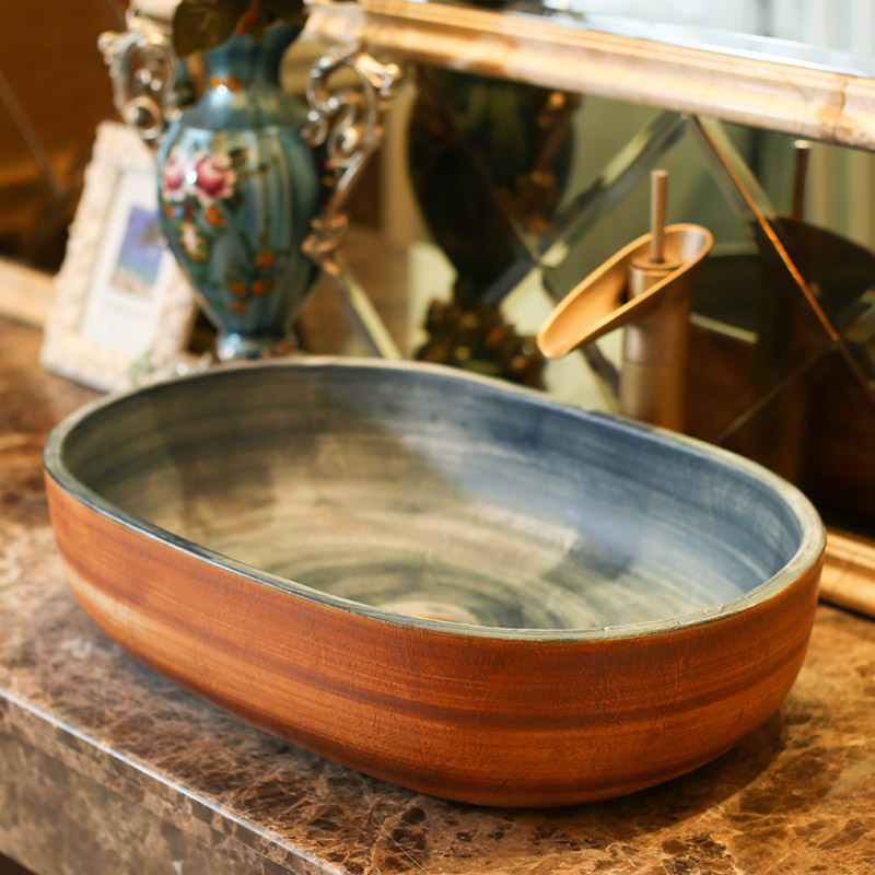 Jingdezhen rain spring on the ceramic basin home for wash basin balcony lavatory elliptic toilet lavabo