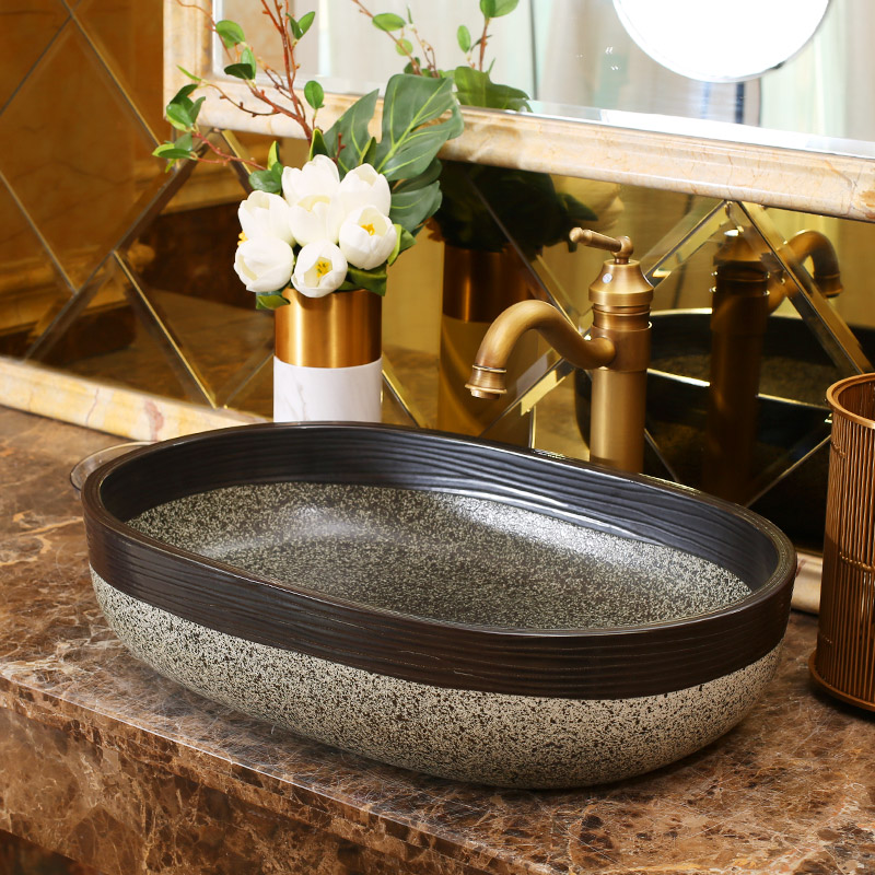 Jingdezhen rain spring basin art ceramic stage basin hotel balcony sink elliptic toilet lavatory