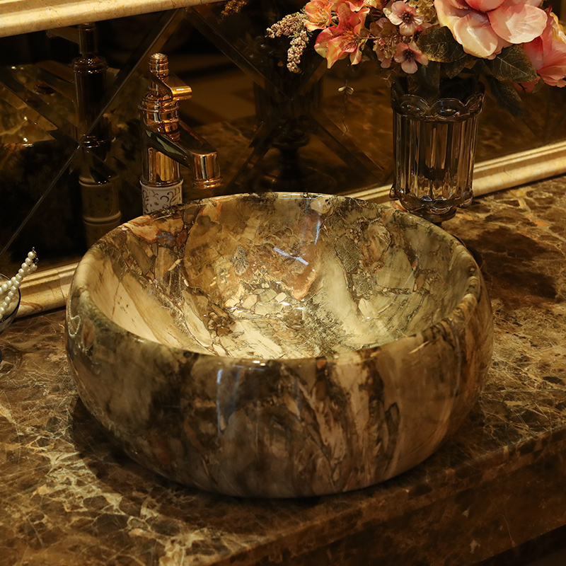 Jingdezhen ceramic stage basin to the art of circular marble basin is the basin that wash a toilet waist drum sink