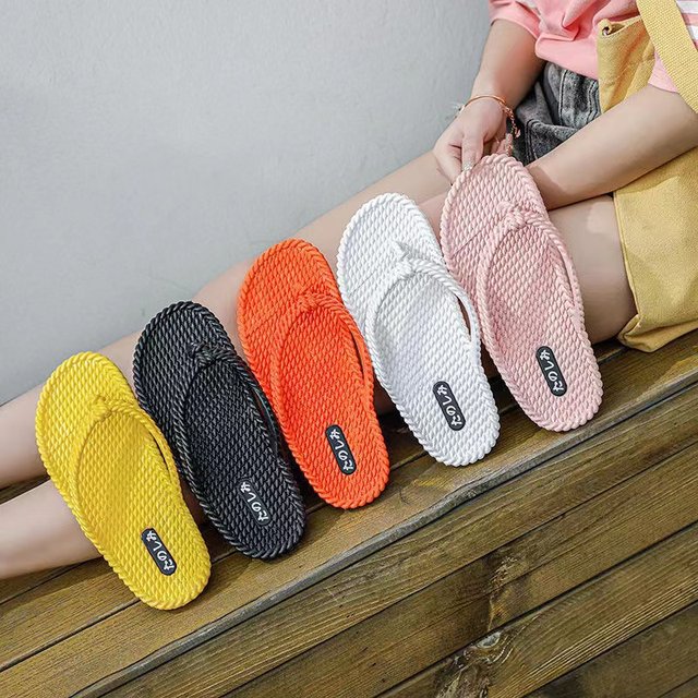 Summer new flat-heel flip-flops solid color plastic simple cool flip-flops straw woven flat Korean beach slippers trendy