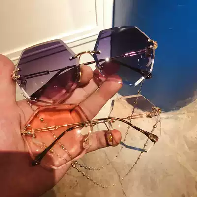 Net red 2019 new with chain sunglasses female Korean version of anti-UV sunglasses Street shooting rimless glasses tide