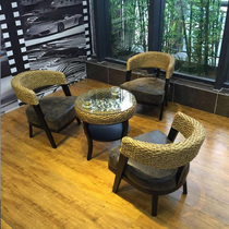 Balcony features rattan table and chair three-piece Indonesian water cane chair Nordic cafe model room small round table and chair combination