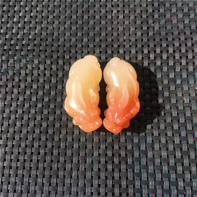 A pair of natural yellow dragon Jade Hongyun head