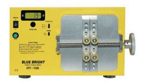 The bottle cap torsion tester is marked with HT-50