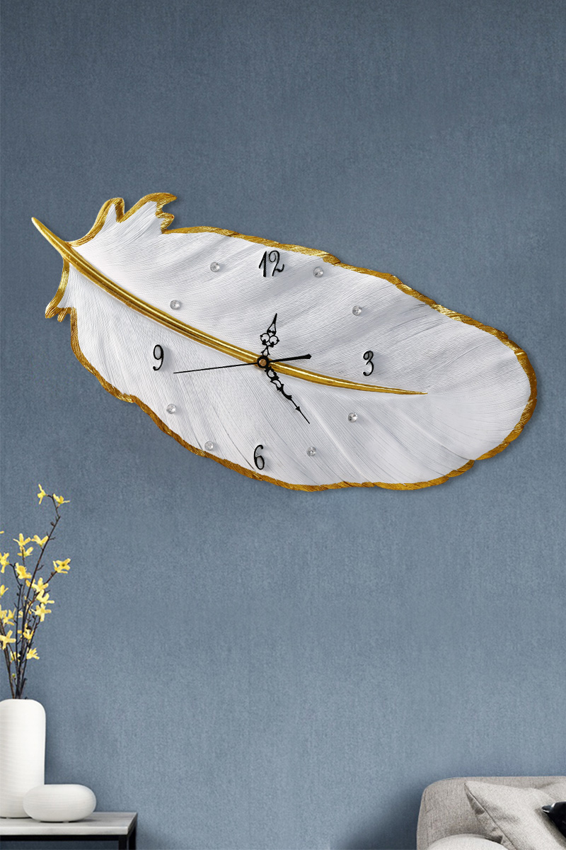 Feather wall clock Nordic light luxury clock wall hanging simple modern household clock Bedroom living room clock creative minimalist