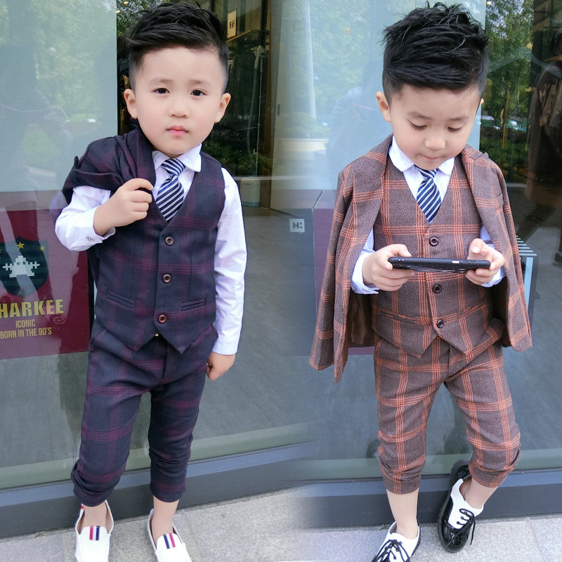 Children's autumn and winter small suits suit men's 2022 new middle and small baby flower tuxedo host walking show piano tide