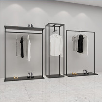 The iron and simple costume stand men and women clothing store display rack hanging rack is hanging on the side of the ground-style hanging clothes shelf