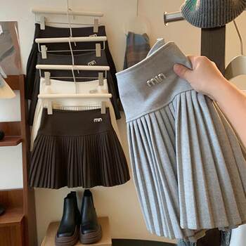 ແມ່ຍິງຮ້ອນຊາວອາເມລິກາ woolen pleated skirt ຂອງແມ່ຍິງດູໃບໄມ້ລົ່ນແລະລະດູຫນາວໃຫມ່ແອວສູງ pleated skirt ກວມເອົາ hips a-line skirt ສັ້ນສໍາລັບຄົນຂະຫນາດນ້ອຍ