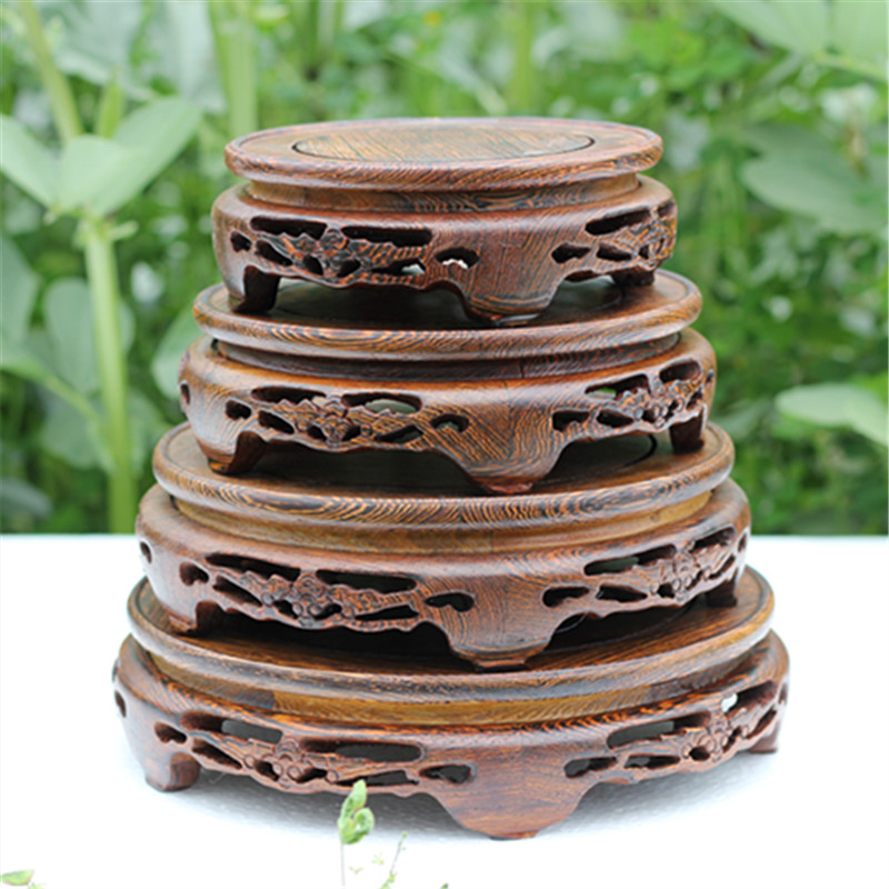 The New Chinese teapot tap vase jade Buddha put frame wenge log mahogany round the base seat