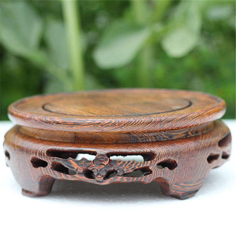 The New Chinese teapot tap vase jade Buddha put frame wenge log mahogany round the base seat