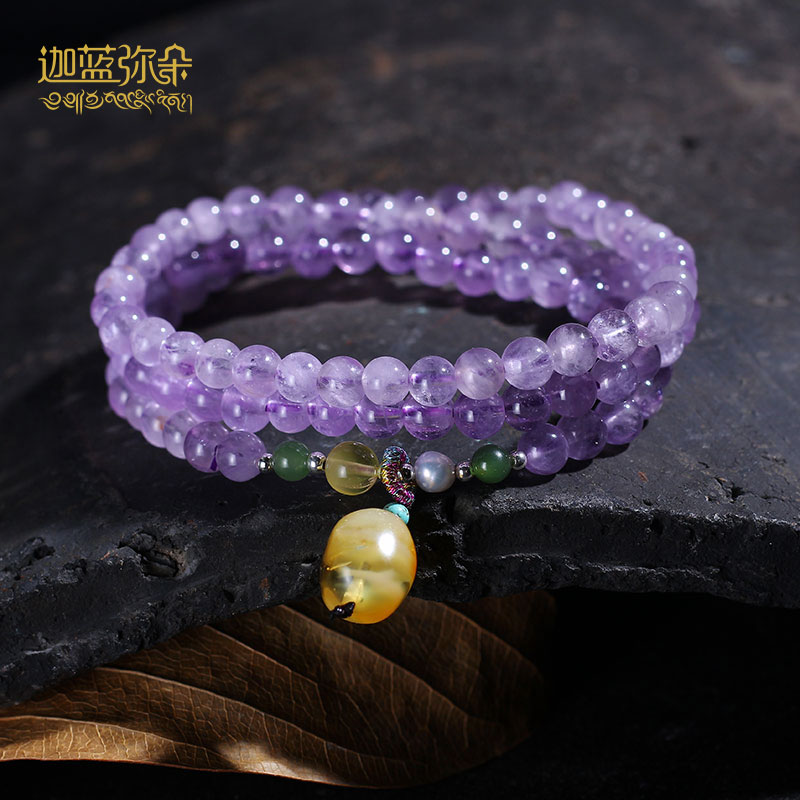 The birthday gift of a woman's hand chain with a multiple lap of a female hand - chain