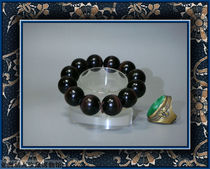 Exhibition of old jewelry from the Qing Dynasty (Zi Qi Dong Lai cat’s eye gemstone Buddha bead bracelet)