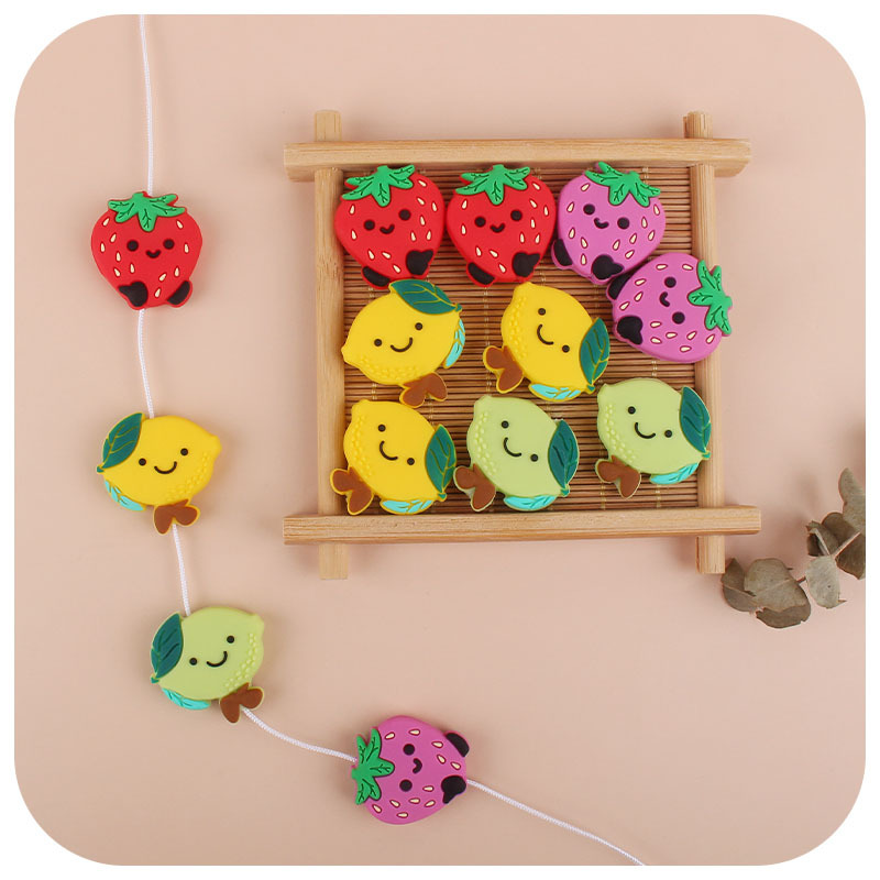 Manufacturers direct food grade silicone fruit strawberry lemon tooth beads DIY accessories baby grinding teeth