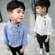 Mùa xuân và mùa thu Trẻ em mặc áo sơ mi trắng trẻ em Hàn Quốc Cotton Oxford Boy Boy Áo dài tay Áo bé trai