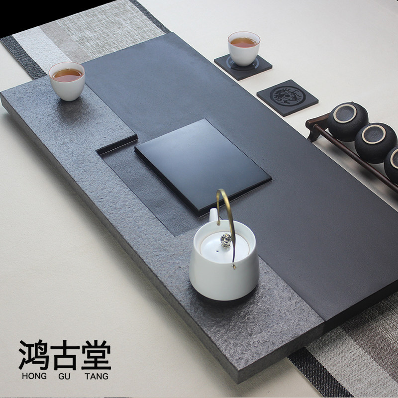 The whole piece of black gold stone tea tray home simple natural stone tea sea drainage large tea table stone kung fu tea set holder