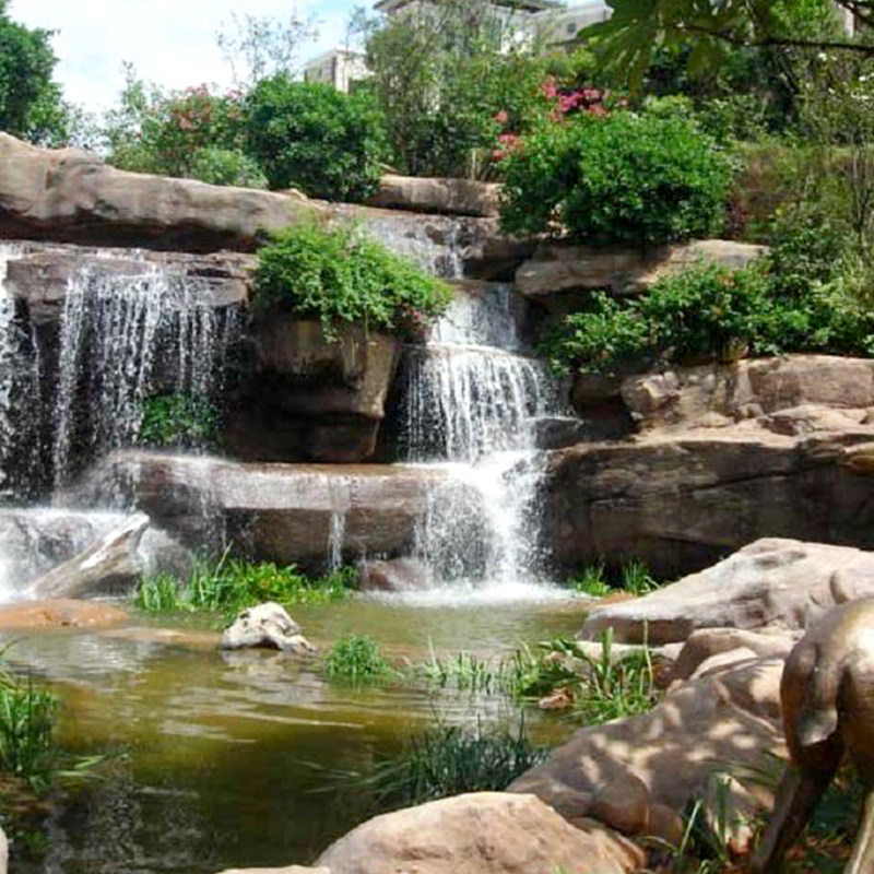 Large outdoor rockery waterfall landscape GRC plastic stone Fengshui gate ecological amusement park craft engineering production