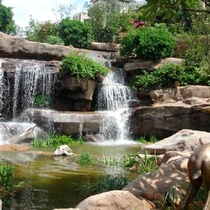 Large outdoor rockery waterfall landscape GRC plastic stone feng shui gate ecological amusement park craft engineering production