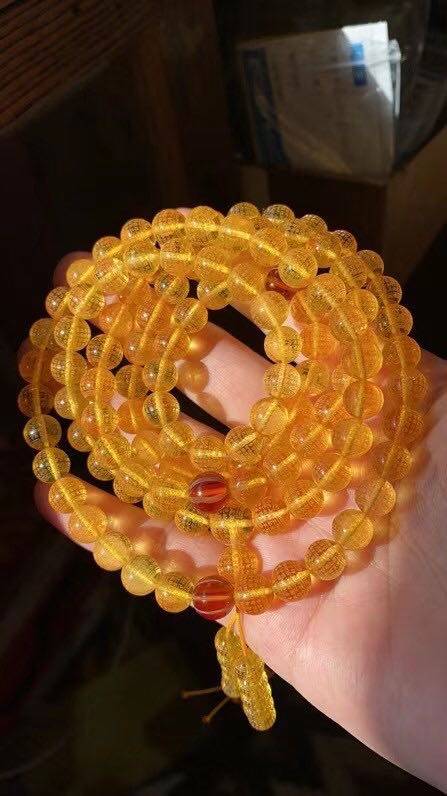 Russian chicken oil yellow water purification Jinpo carved heart bead 108 Buddha beads hand necklace