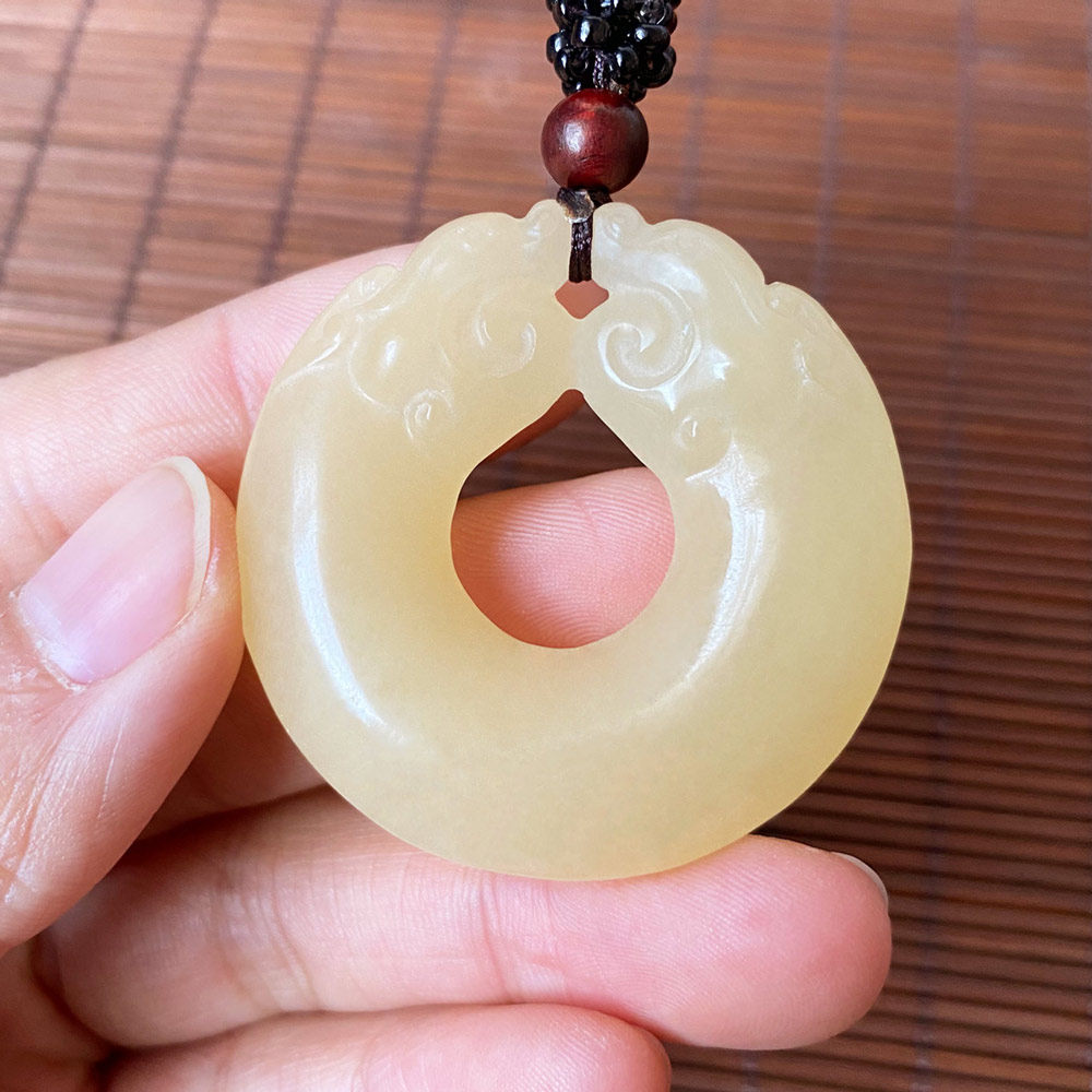 Huang Longyu Shuanglong with the main imitation of ancient Yupei pendant for men and women to run jade pendant