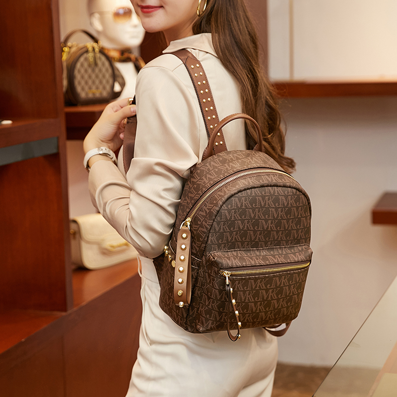 Leather mk backpack women's new old flower material casual backpack fashion all-match commuter school bag pet bag
